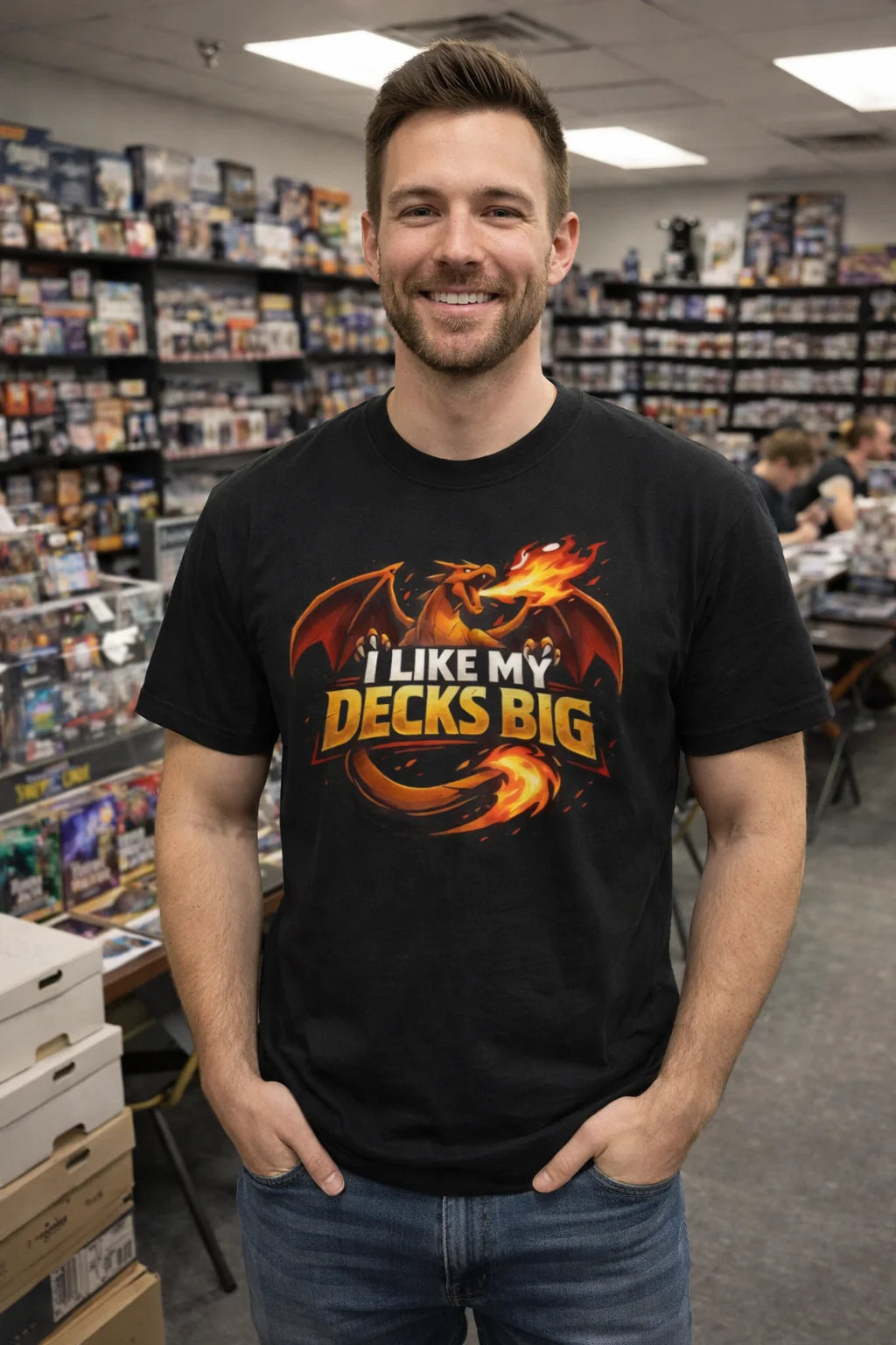 Man wearing a black t-shirt with a dragon graphic and text in a store setting